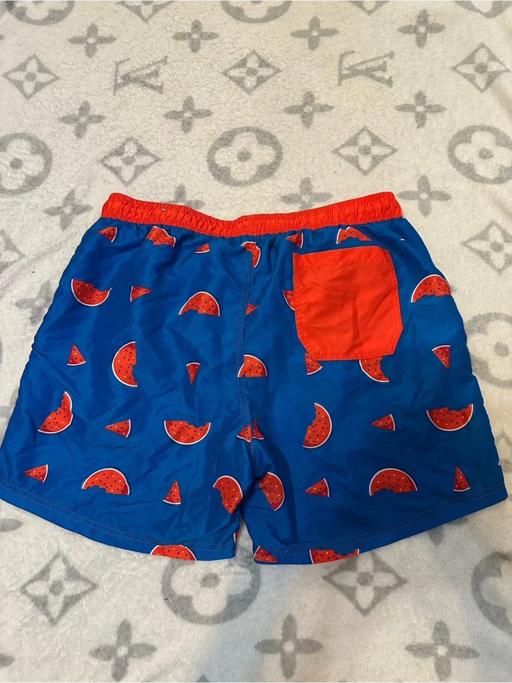 Celebrate It Blue Swim Trunks with Red Watermelon Print